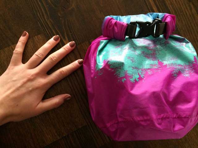 Full first-aid kit, hand for scale.